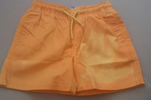 Spodenki krótkie chłopięce pomarańczowe 98-104 Lupilu 
